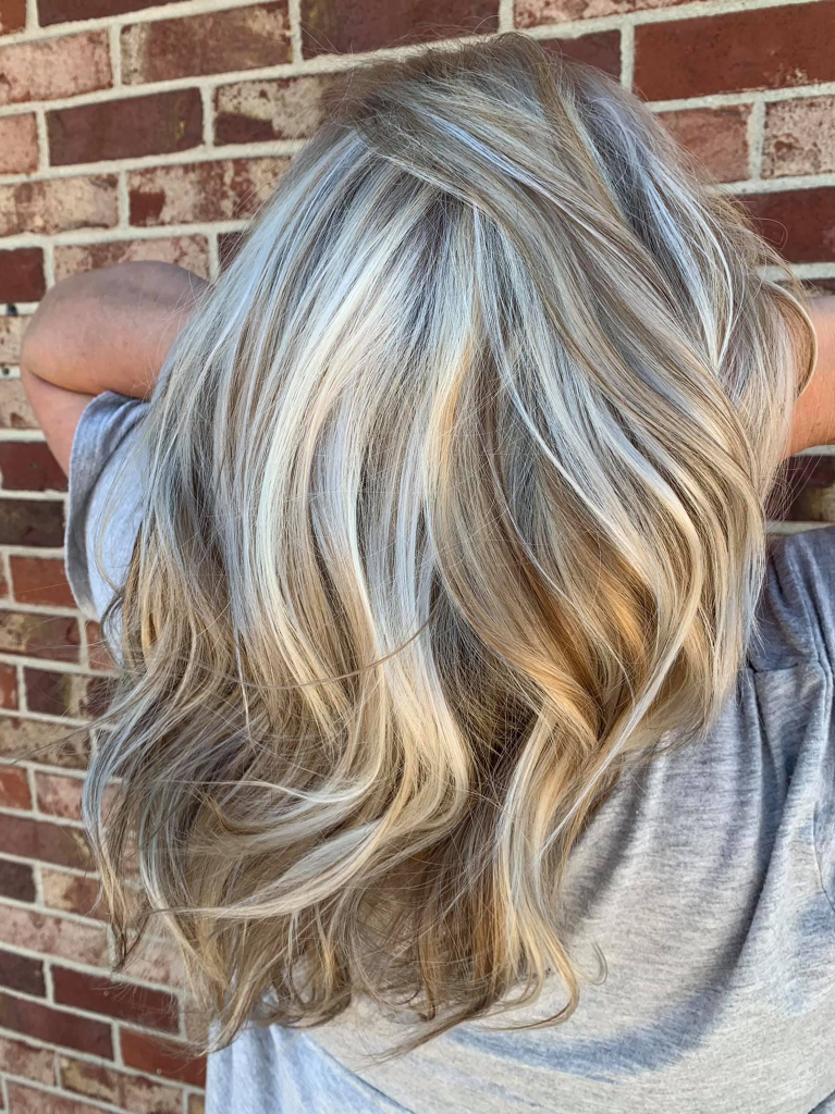 Healthy haircut with blonding and balanced shape and natural movement