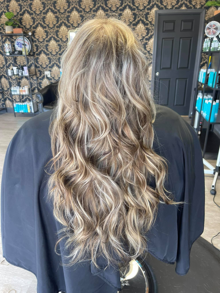 Blonding and brightening result by Cedar Rapids hair color specialist