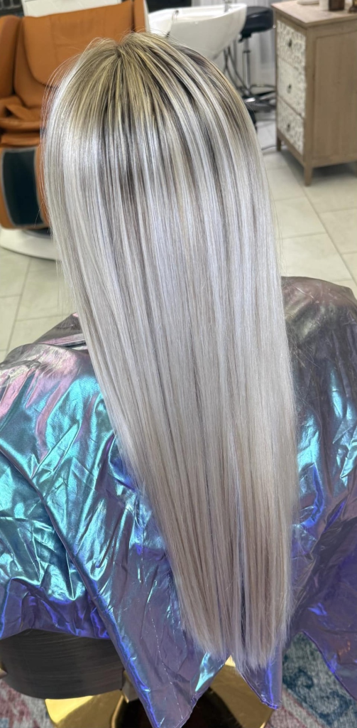 Blonding and brightening result by Cedar Rapids hair color specialist