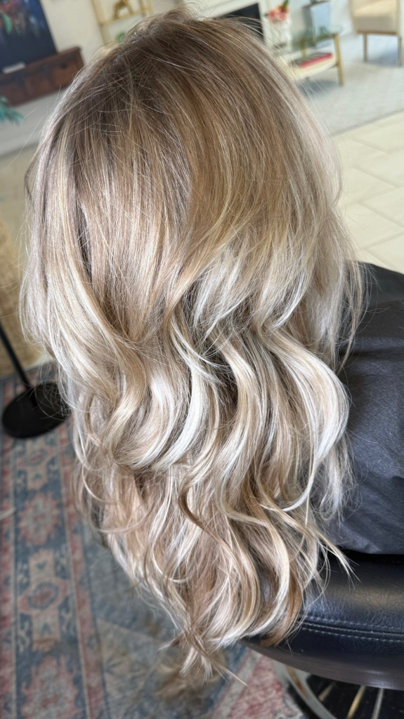 Blonding and brightening result by Cedar Rapids hair color specialist