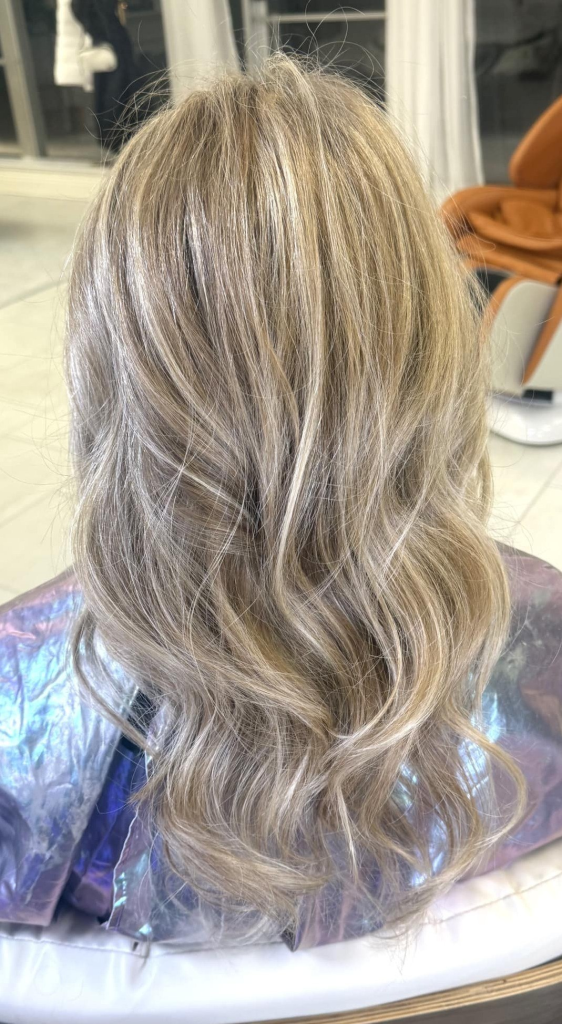 Blonding and brightening result by Cedar Rapids hair color specialist