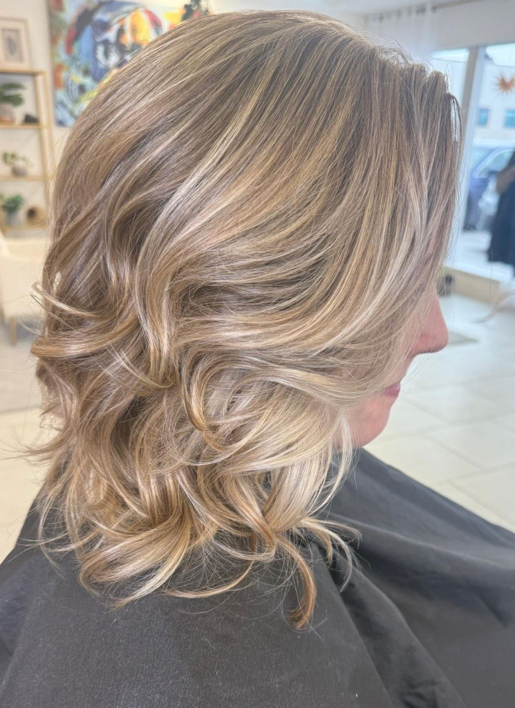 Balayage with blended highlights and natural dimension