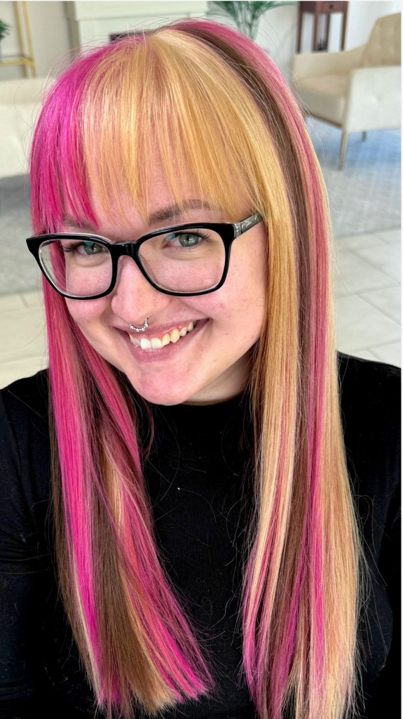 Bold vivid hair color with block color pink brown placement